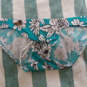 NEPTUNE DESIGNER SWIMBRIEF, SIZE SMALL, WHITE FLOWERS ON TEAL (Pre-Owned)